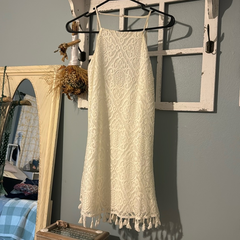 White lace dress with tassels